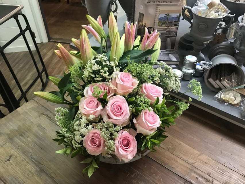 Just the thing to make her day! Beautiful arrangement of roses and