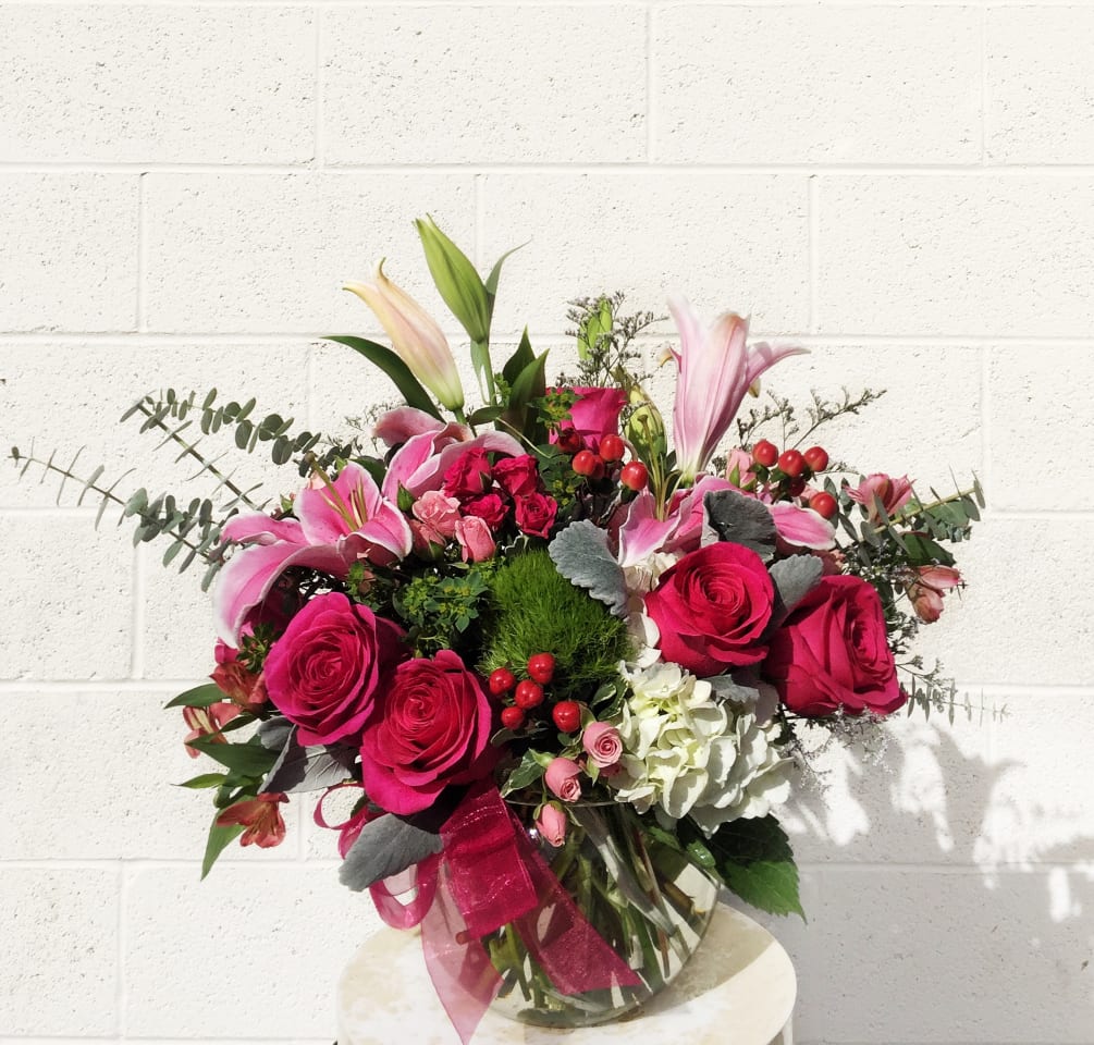 A beautiful design including hydrangea, rose, lily, sweet william, fragrant stock and