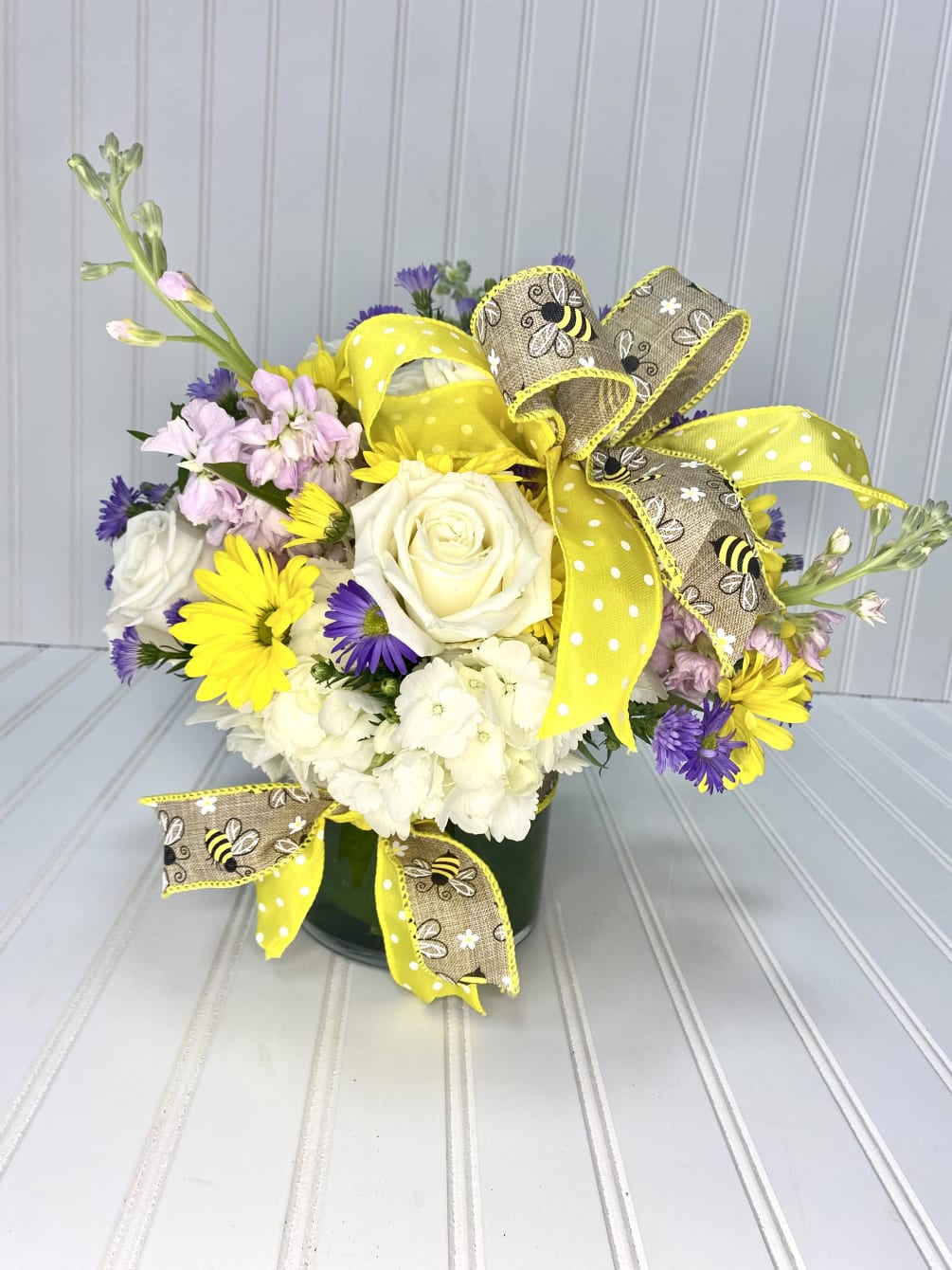 Bzzzzzz catch all the buzz with this charming little arrangement filled with