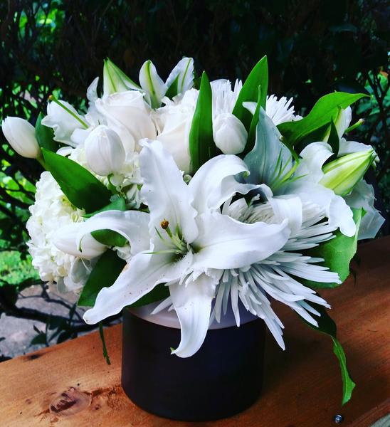 Flowers Included:

White Roses; White Spring Roses; White Lilies; White Hydrangeas; White Button