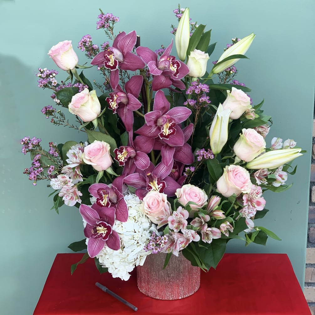 A one of a kind arrangement perfect for any occasion. Beautifully designed