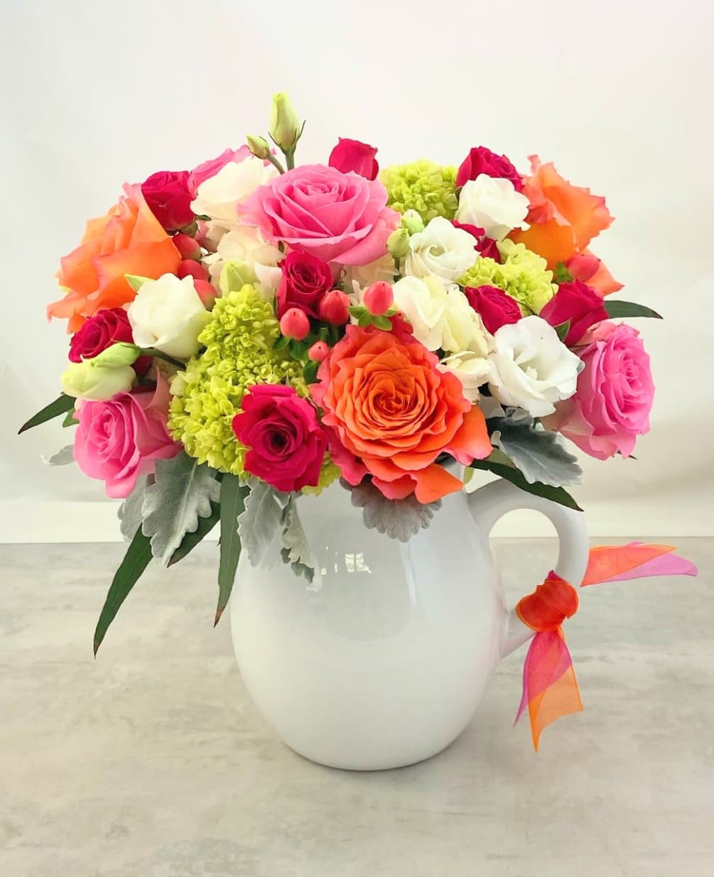 The Pitcher Perfect Bouquet is sure to bring a smile to your