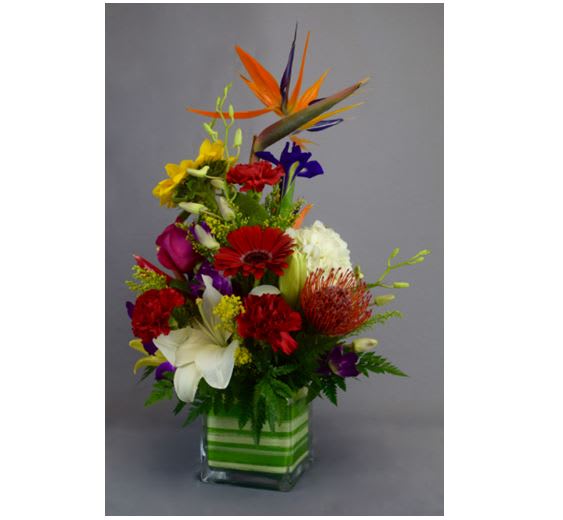 Mixed colorful tropical flowers. Bright and bold. 