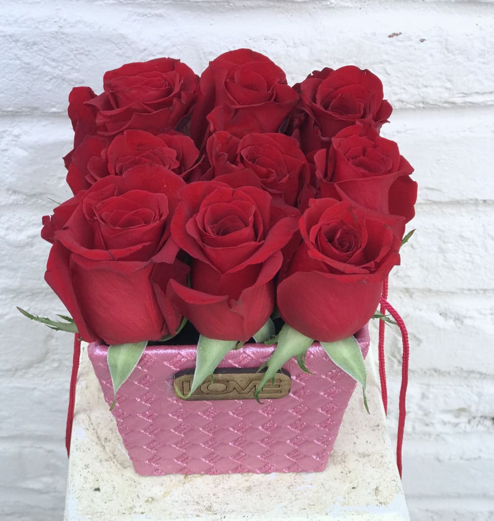 Nine Red Preserved Roses in a Box. We can also include in