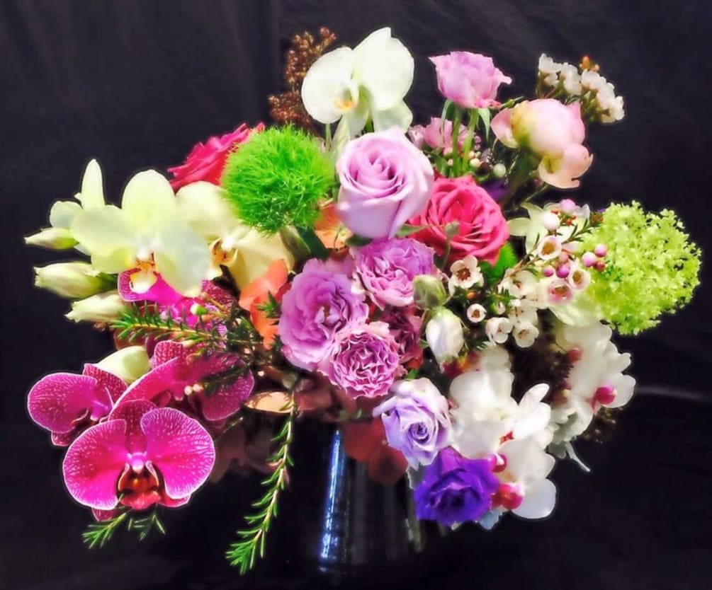 Arrangement of purples, pinks, whites, and more.