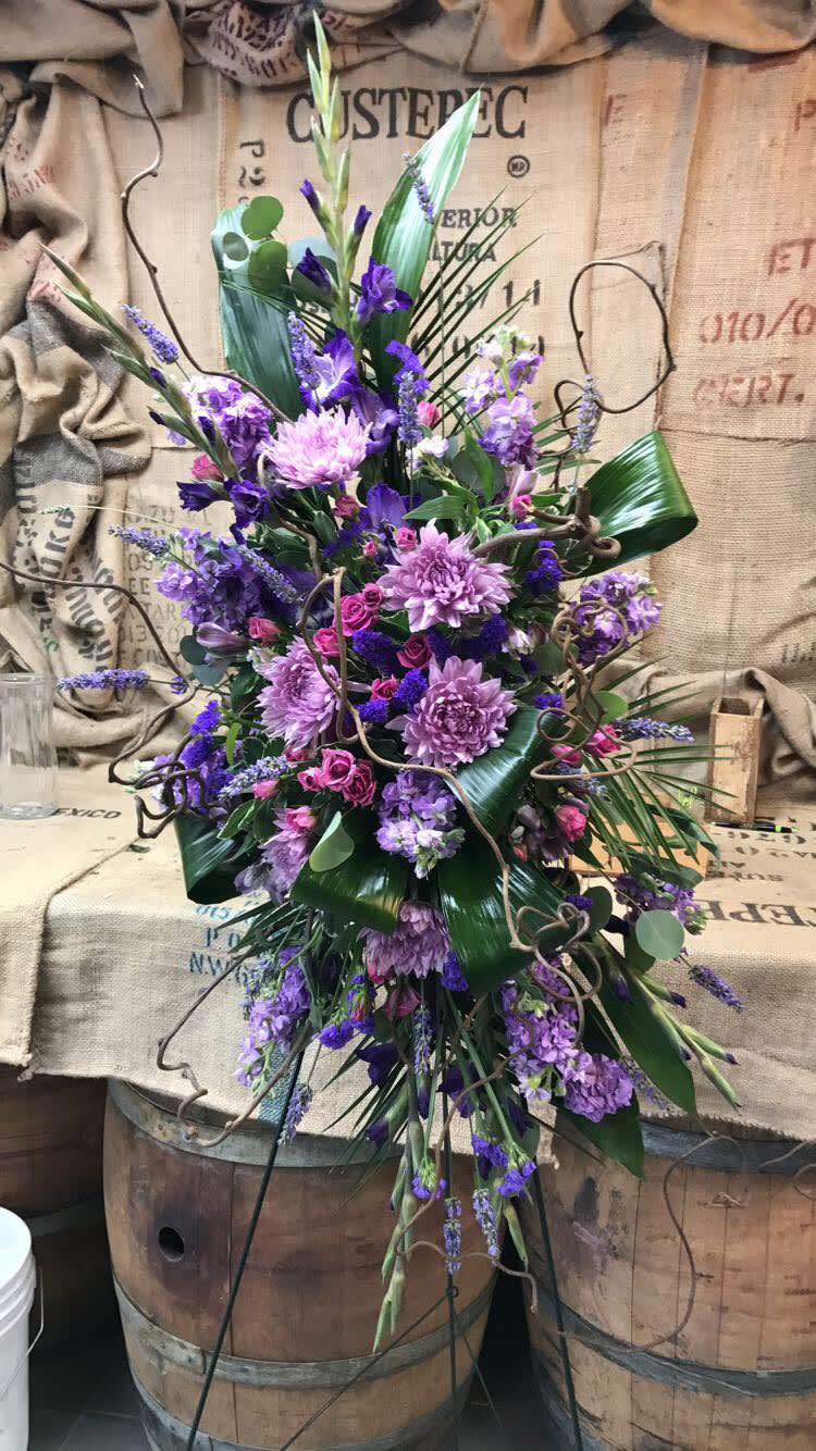 Our designers built this spray with all kinds of purple flowers! 