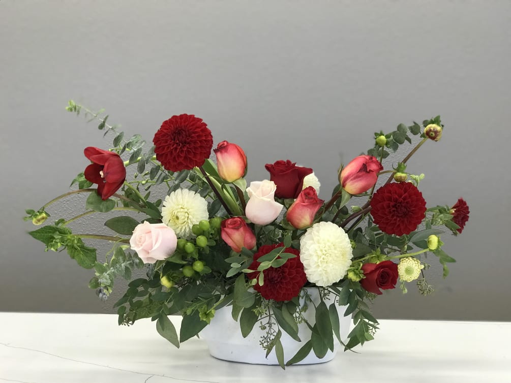 Blush Roses and Red Dahlias batting their eyelashes from across the room.