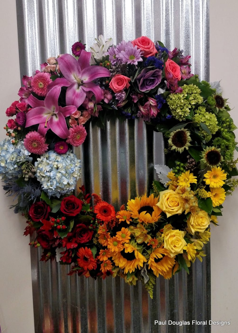A tribute wreath designed with a color pallet that will lift a