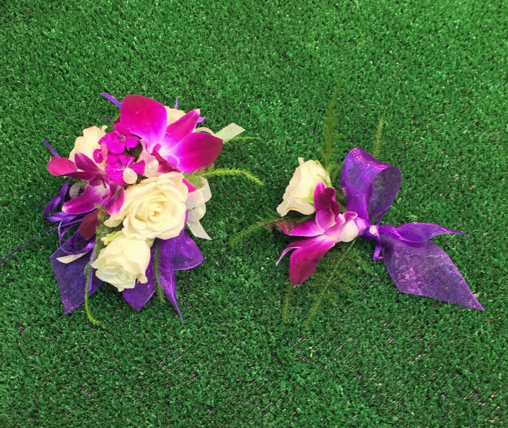 Wrist corsage and boutonniere in purple and white. CUSTOMER CAN CHOOSE ANY