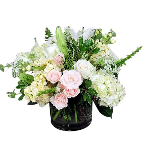 Bring the gardens indoors with a lush assortment of creams, whites and