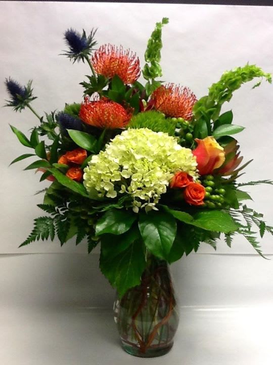 This beautifully designed arrangement says it all!