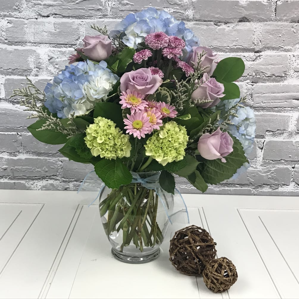 Gorgeous bouquet in soft lavender and blue hues with a hint of