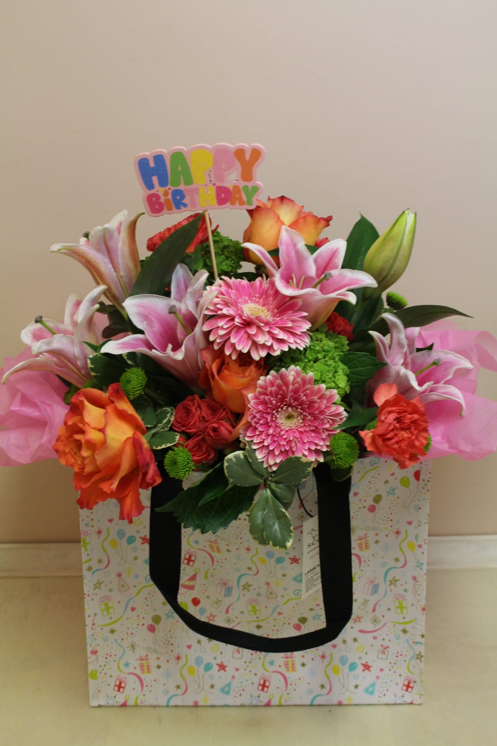 Say Happy Birthday with a great gift, flowers and a festive bag!

The