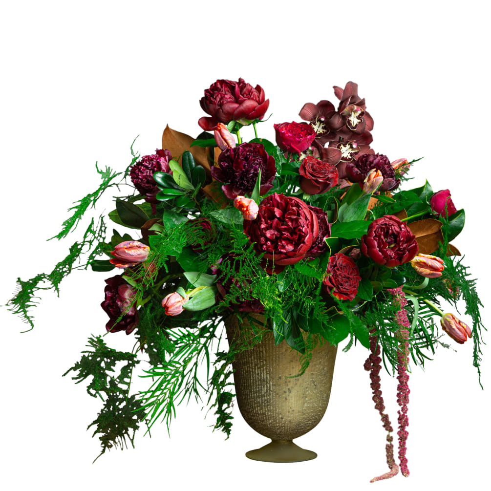 Peonies, orchids, garden roses, rococo tulips and magnolia foliage in beautiful rich