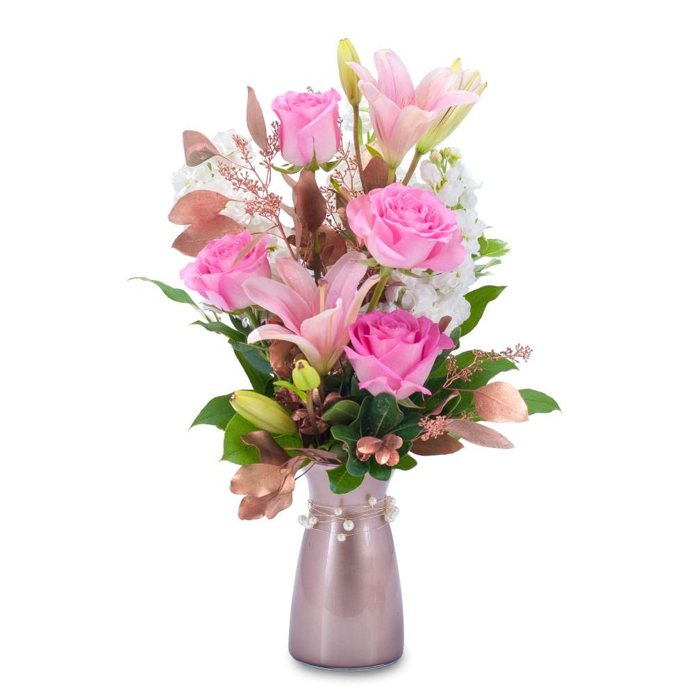 This combination of pink roses and assorted flowers with rose gold foliage