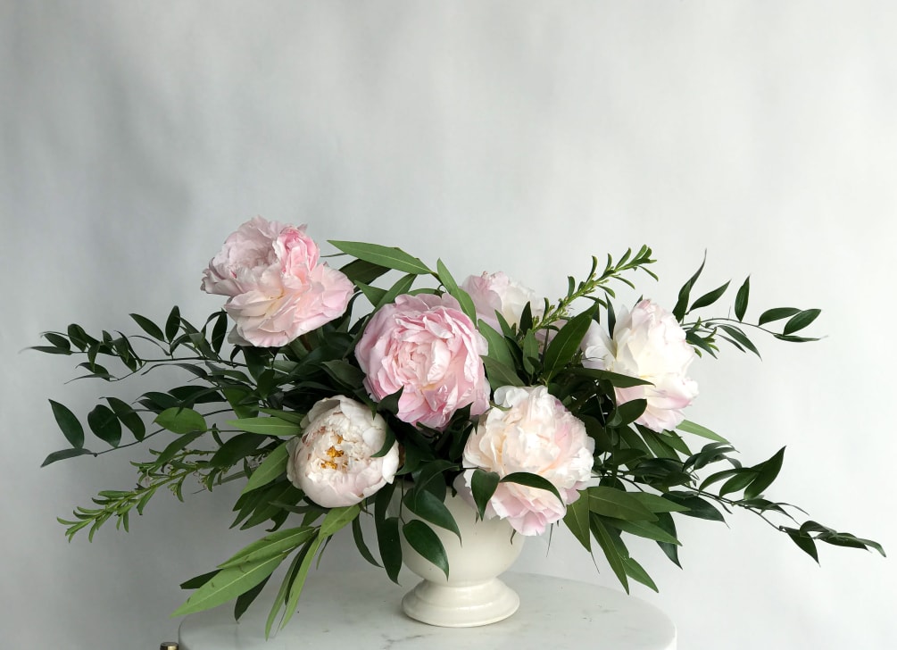 Overflowing with sweetly scented peonies shipped in weekly from our Alaskan peony