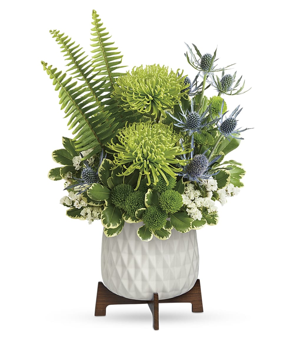 Gorgeous green blooms and a mod, mid-century ceramic planter add up to