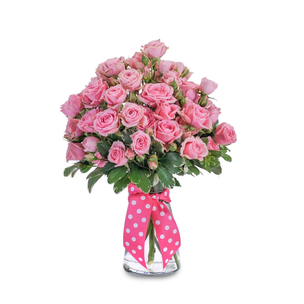 &quot;This design of pink spray roses is overflowing with beauty and accented