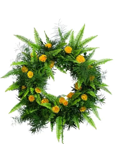 The circular shape of a wreath symbolizes never ending love. Yellow roses