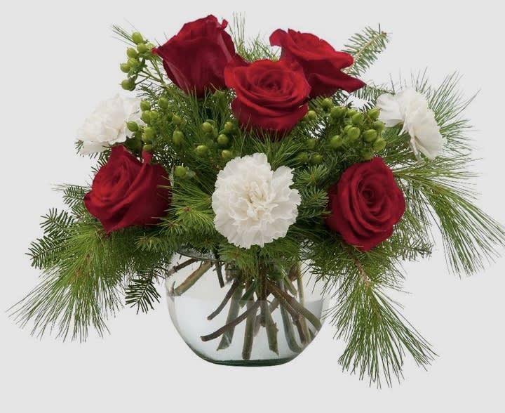Our classic Christmas bouquet is bundled with red roses &amp; carnations drizzled