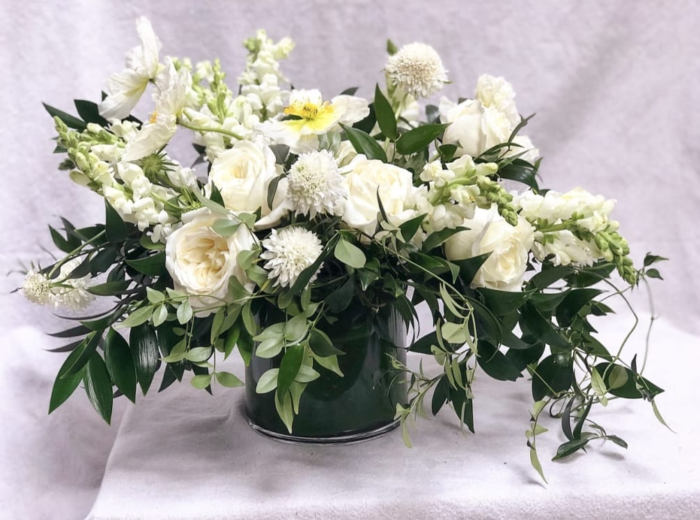 *DELUXE VERSION SHOWN* A garden mix of beautiful white flowers and deep