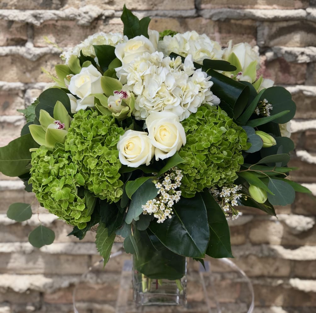 *DELUXE VERSION SHOWN* This beautifully designed arrangement is delivered in a tall