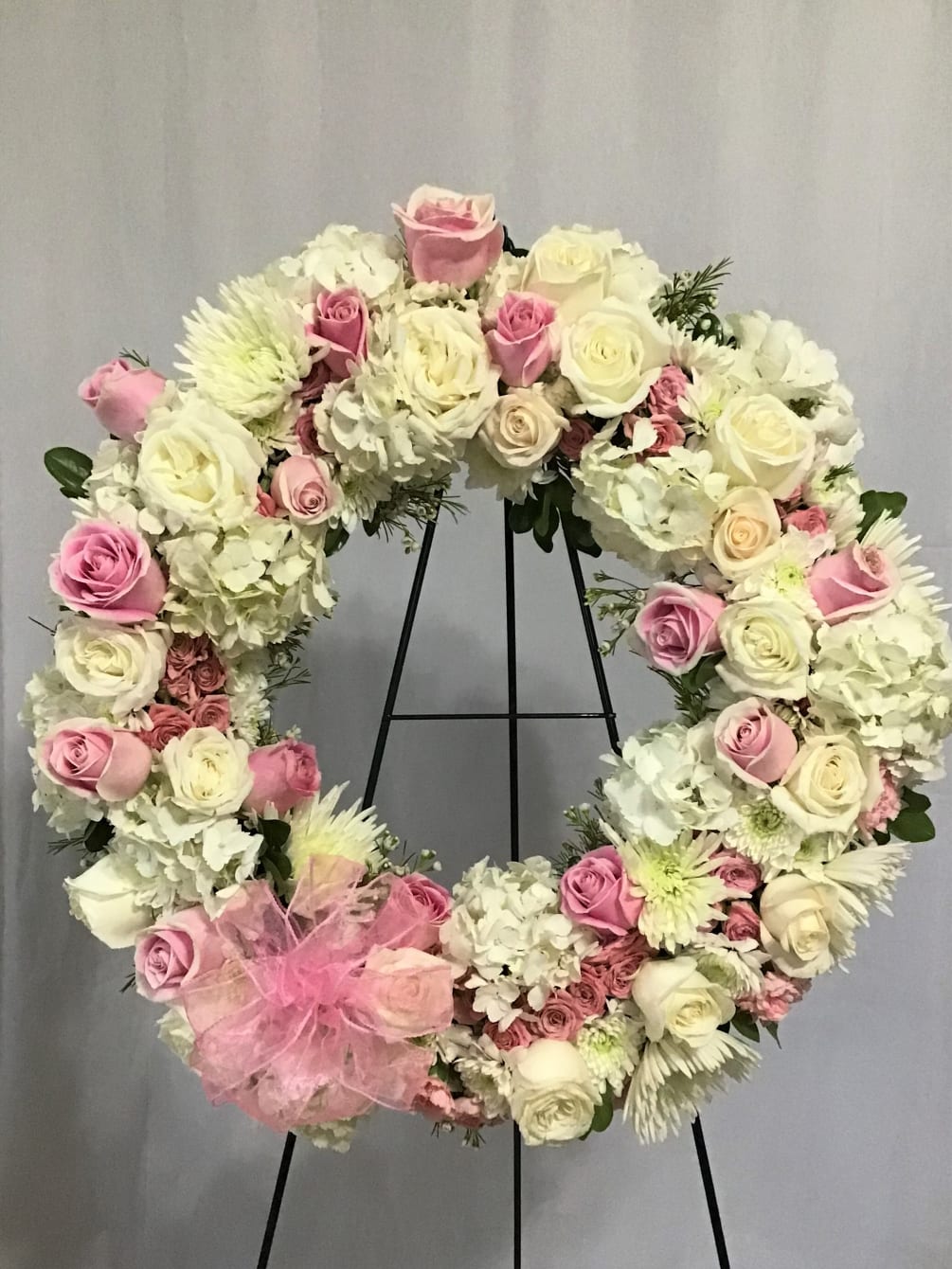 Beautiful wreath with cr&egrave;me and pink roses, white hydrangea and white chrysanthemums