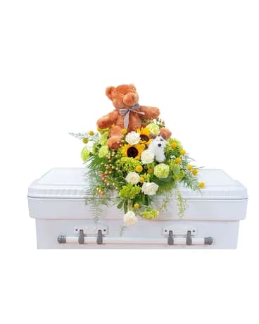 This sweet combination of flowers and plush is perfect for a tiny