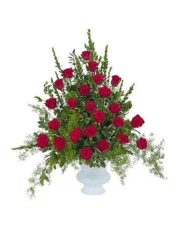 Red roses and premium foliage combine to make this elegant tribute.
Approximate size: