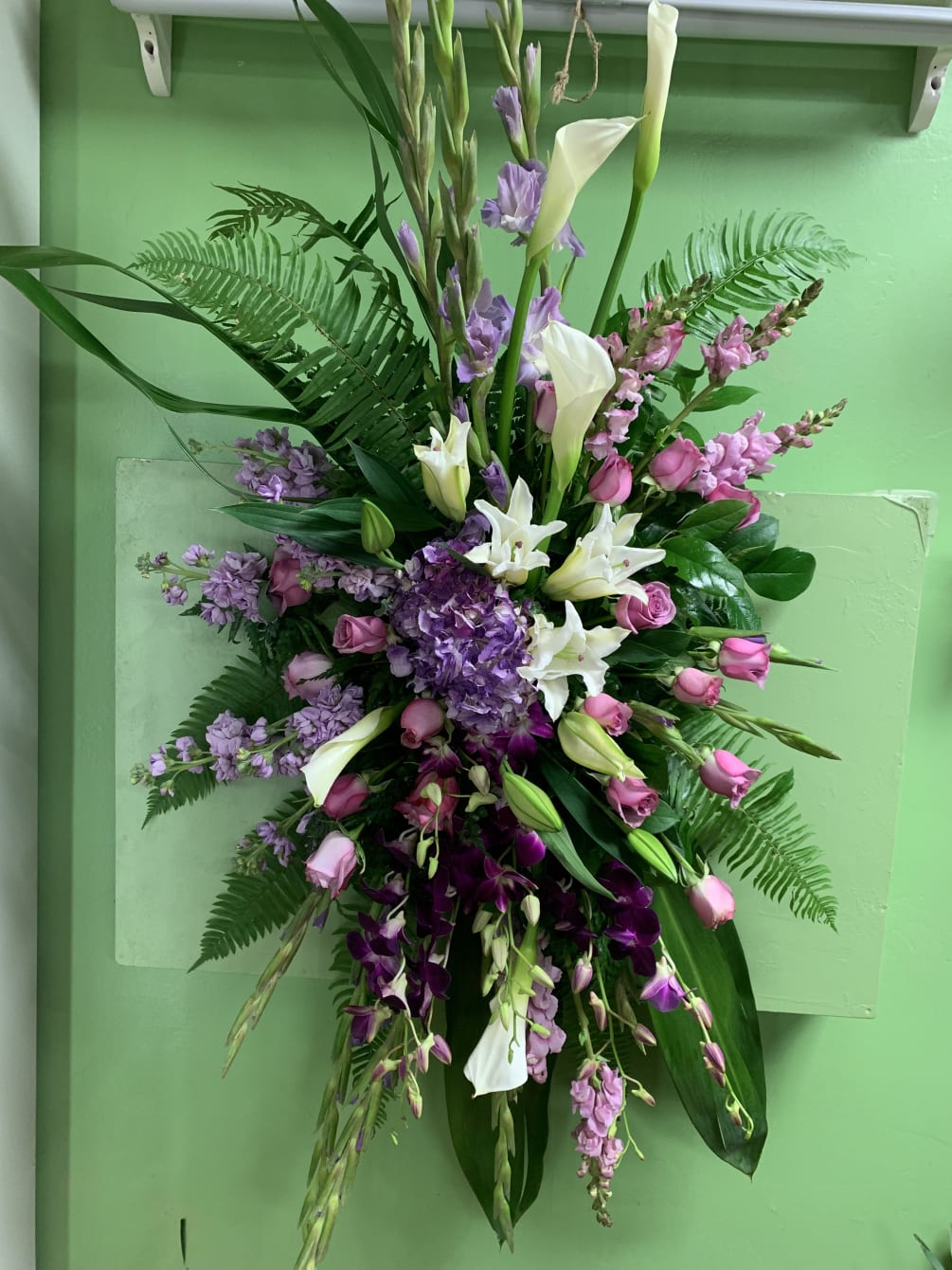 A beautiful elegant combination of high ends flowers in lavender, white, purple!