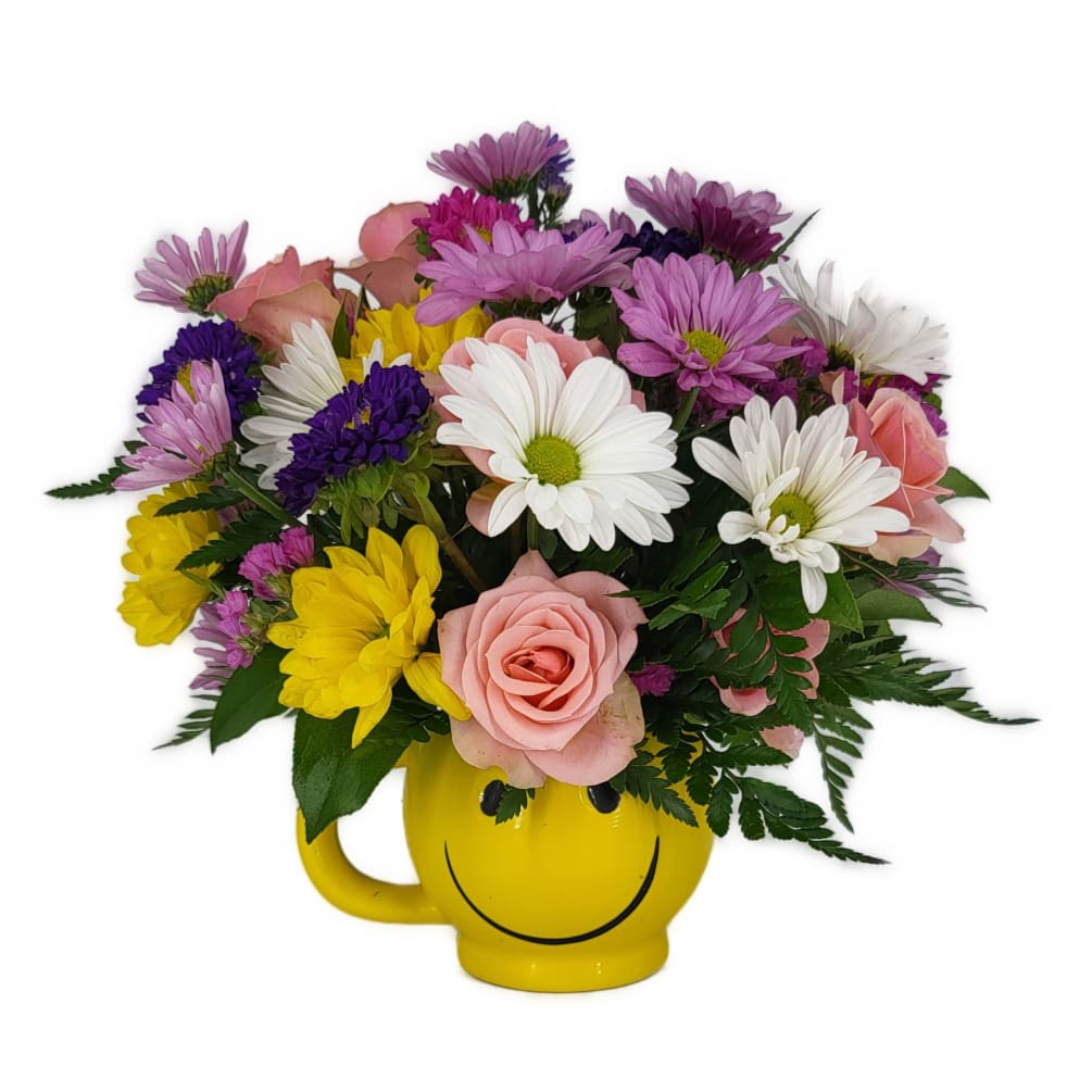 Send smiles across the miles with this magnificent mug of blooms! This