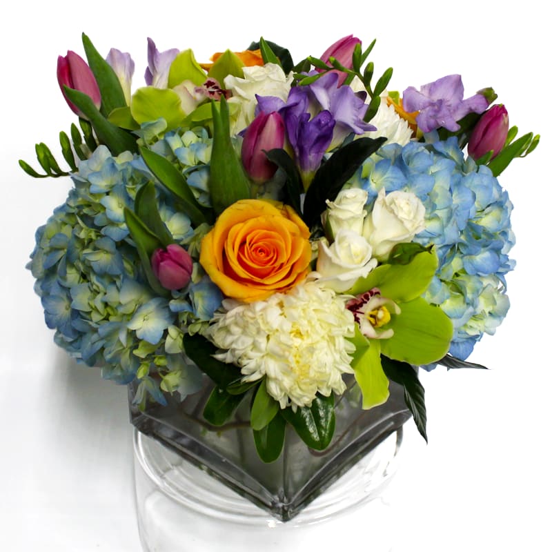 This floral design mixes various spring colors to bring a splash of