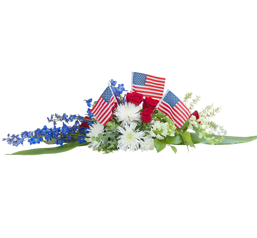 Red, white, and blue centerpiece with flags.
Approximately 12&quot;W X 24&quot;L