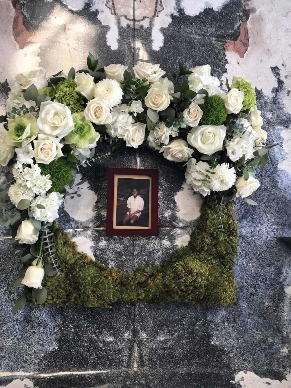 This wreath is designed with White Roses, White and Green Hydranges, White
