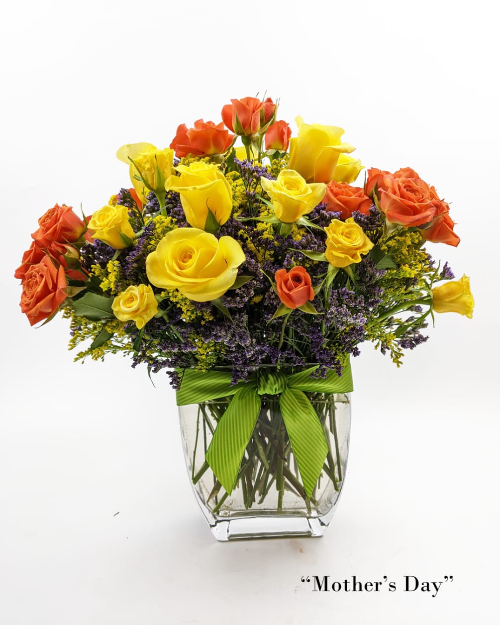 Hand-crafted mixed flower bouquet in a clear vase.Each purchased arrangement may differ