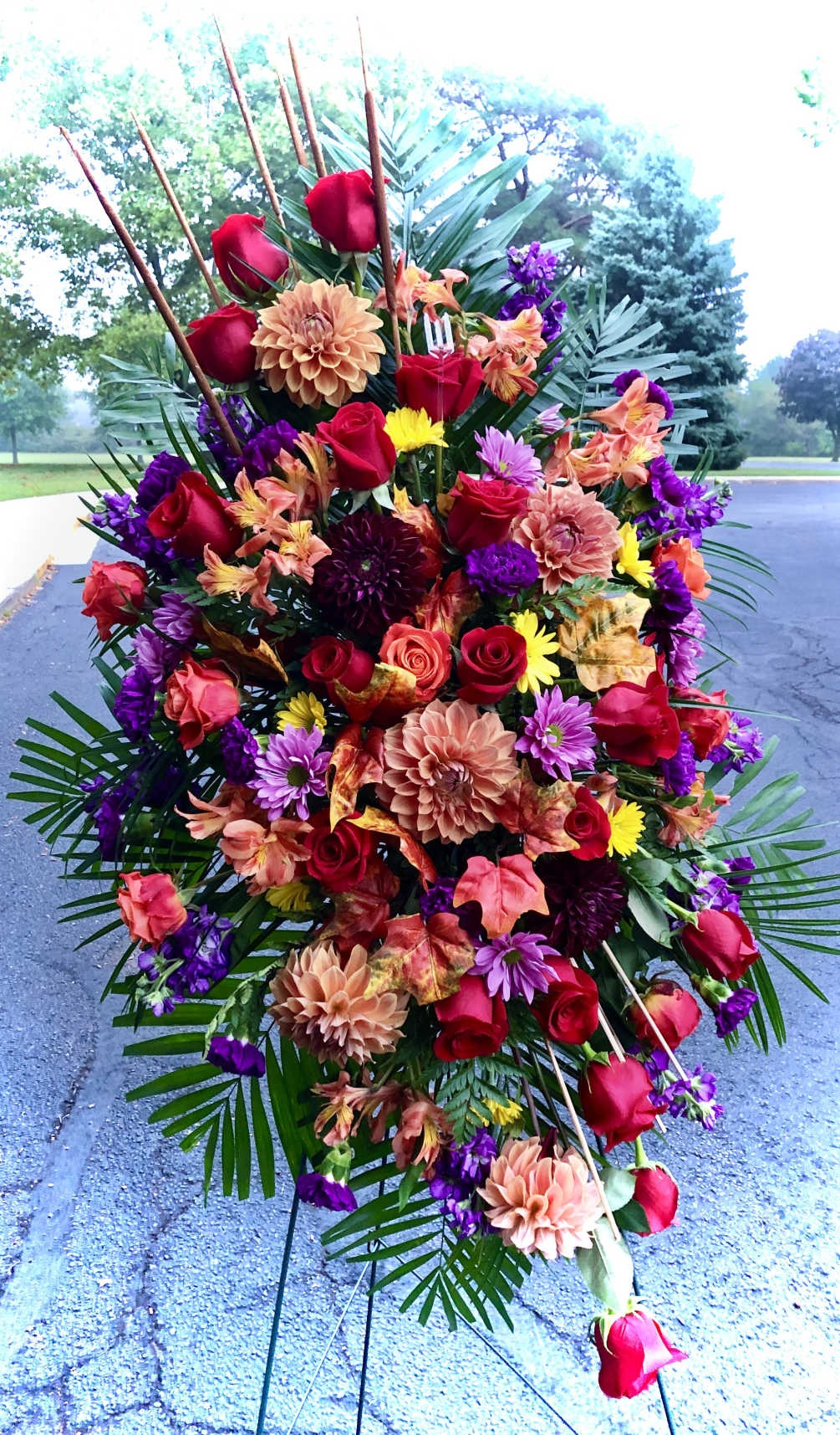 Beautiful mix of Fall colors, with roses, carnations, dahlias, lilies, alstroemeria, daisies