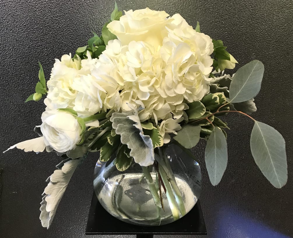 SSWG 
Why not send this simply beautiful arrangement of white flowers and