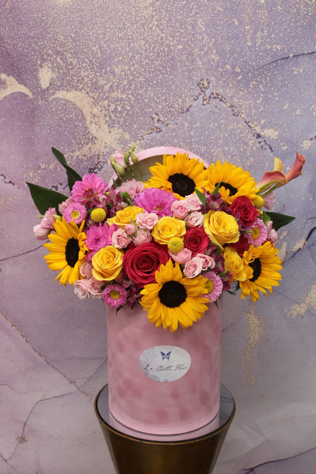 Bright, Bold sunflower mixed flower box arrangement. 