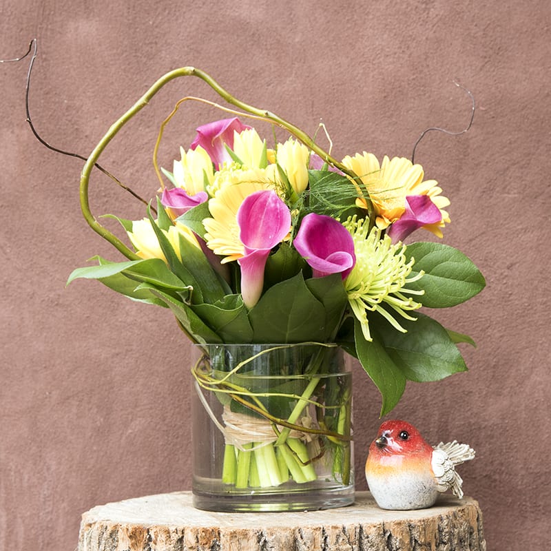 A happy collection of spring blooms such as mini callas,
green hydrangeas, tulips