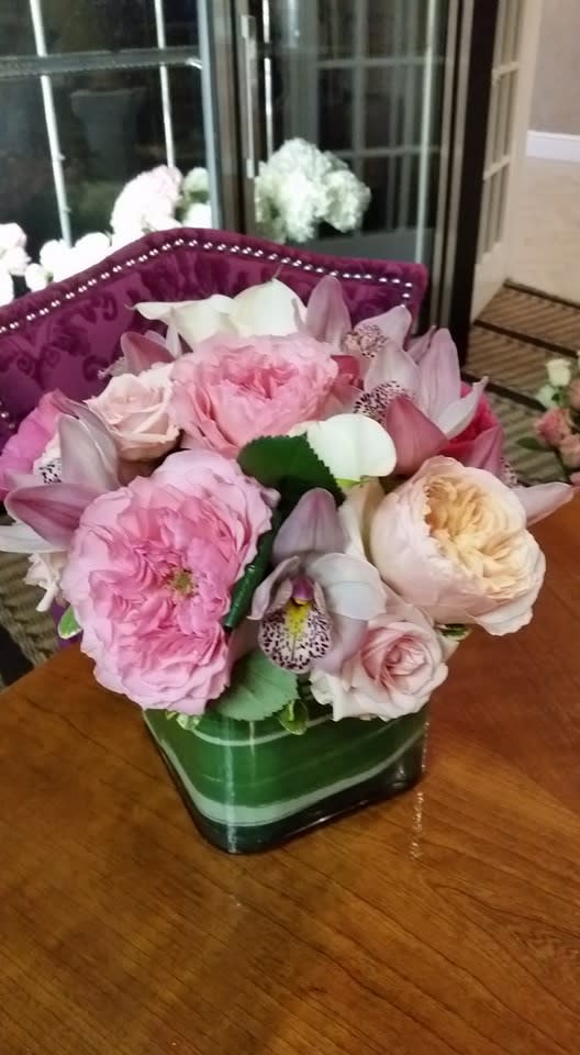 pastel roses and cymbidiums