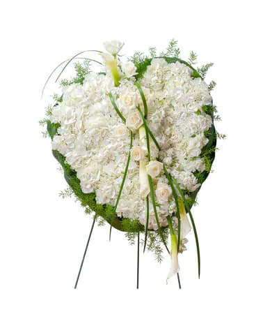 A combination of cream and white blooms in this heart creates a