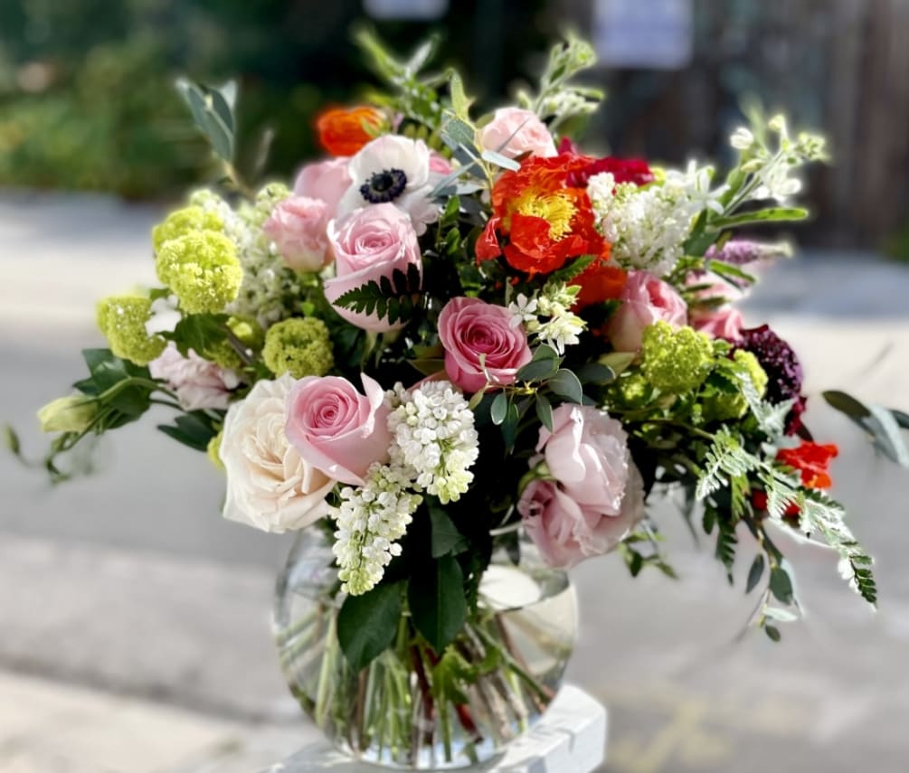 A beautiful design with very soft pink roses, poppies, lilac, Veronica, lisianthus