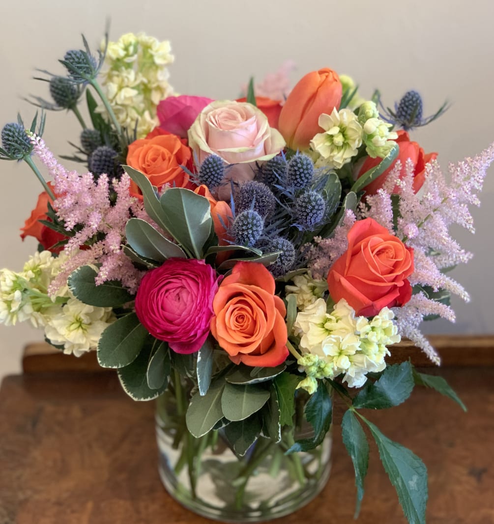 A vibrant mix of colors and textures makes this arrangement the perfect