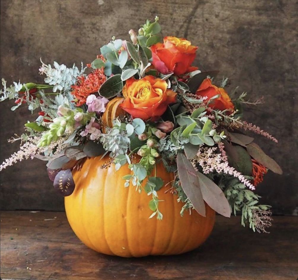 This pumpkin is sure to please! Send your special someone fall flowers