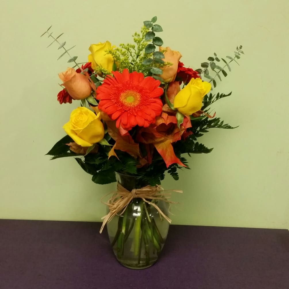 This arrangement is truly stunning. The bold colors that represent the fall