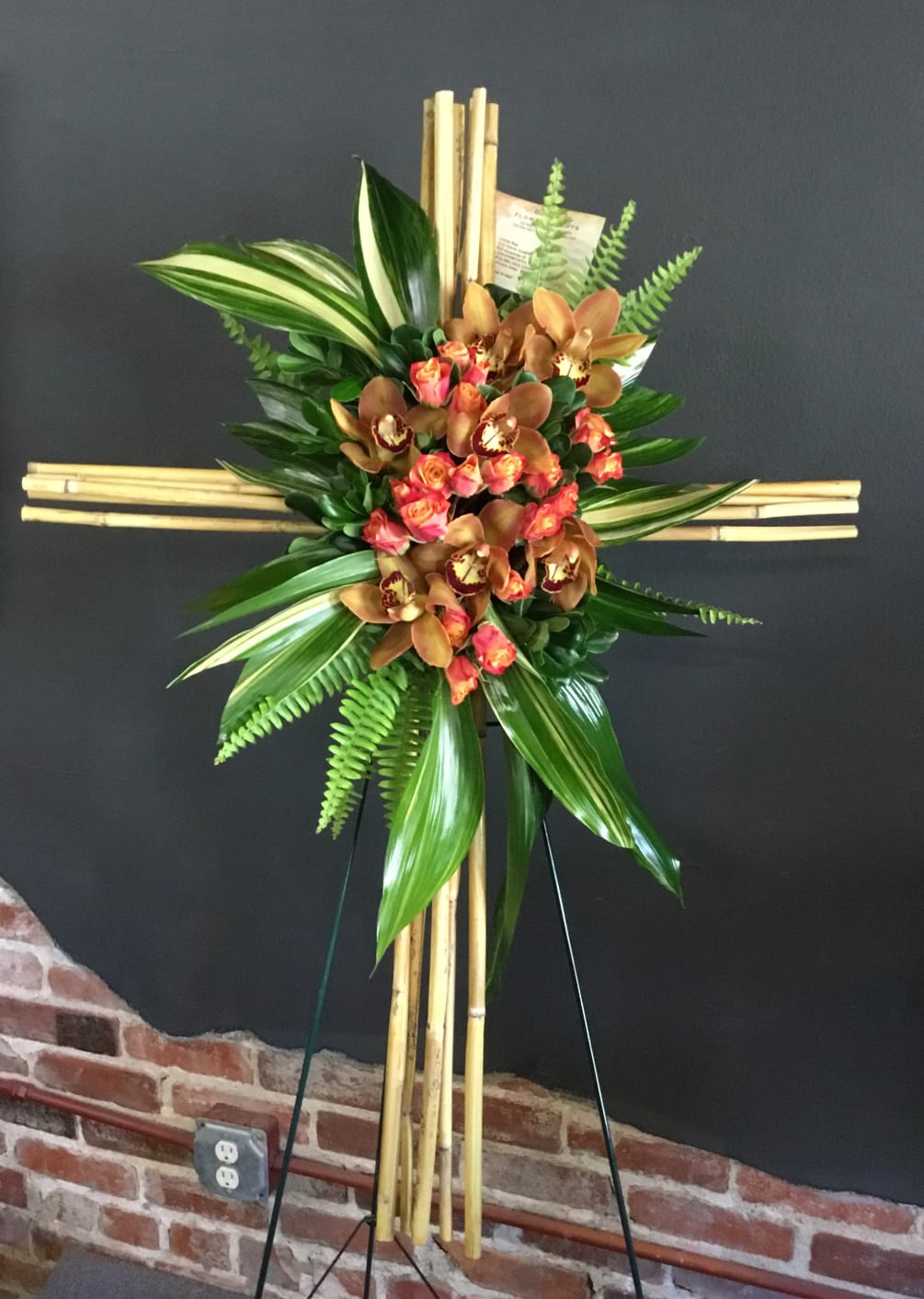 Bamboo Cross With Orchids, Spray Roses and Tropical Greens
