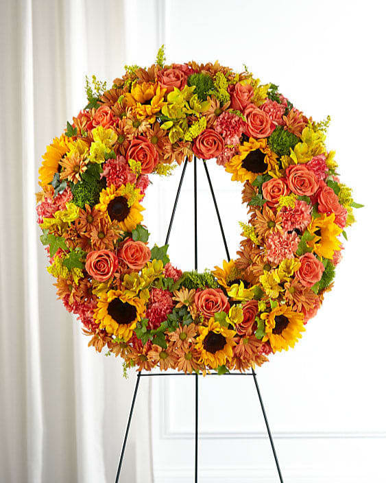 Our Autumnal Memories Wreath captures the season with fresh, harvest hues. This