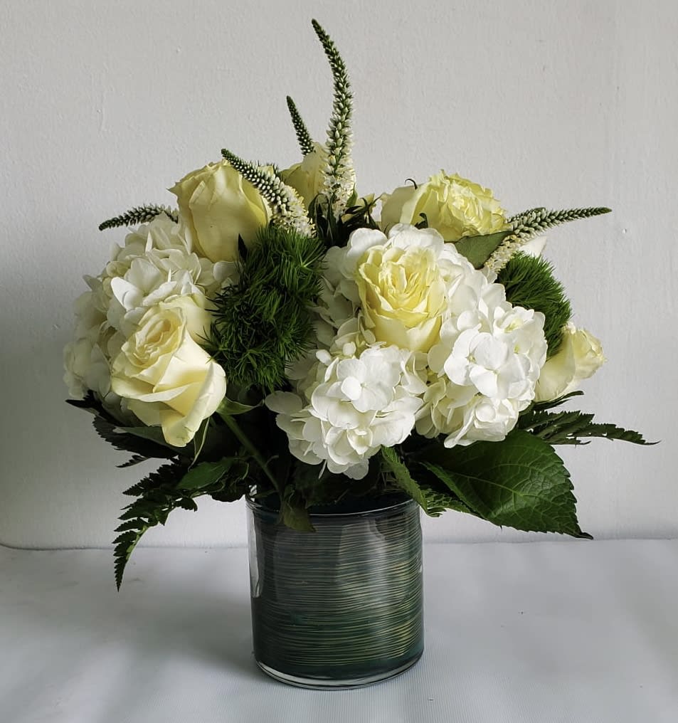 Beautiful Arrangement white and green for any special occasion. With Flowers such