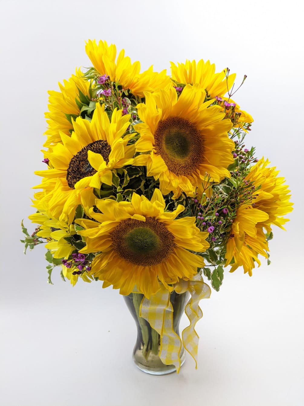 Hand-crafted mixed bouquet. The main flowers in this arrangement are sunflowers, and