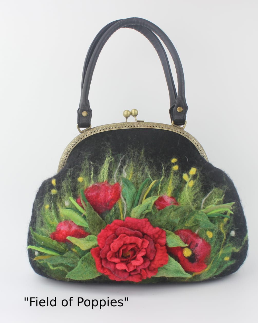 This wearable art handbag is crafted from handmade wool felt in a